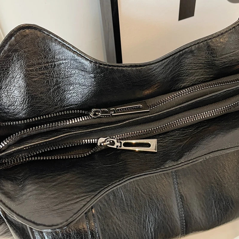 Elegante schwarze Ledertasche 