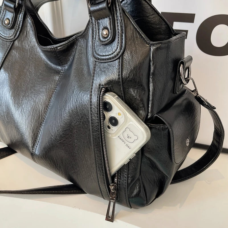 Elegante schwarze Ledertasche 