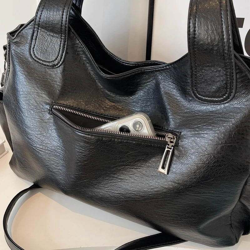 Elegante schwarze Ledertasche 