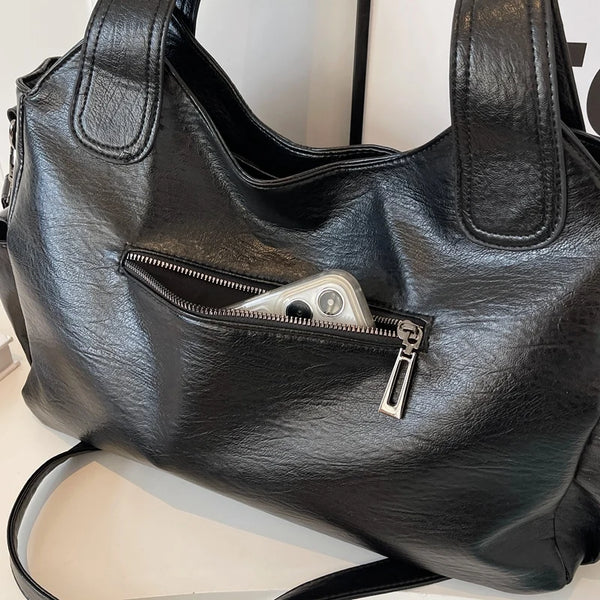 Elegante schwarze Ledertasche 